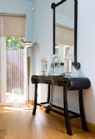 Modern console table with scrolled ends