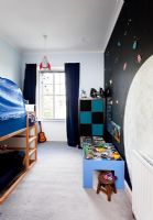 Childs bedroom with large mural