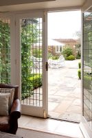 French doors with view of patio