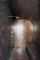 Contemporary shower with brown mosaic tiles
