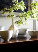 White pottery on console table