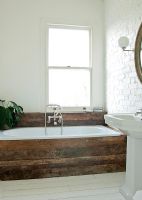 Bath with distressed timber surround