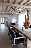 Dining table with driftwood sculpture