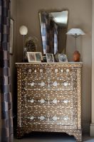 Wooden chest of drawers with shell inlay