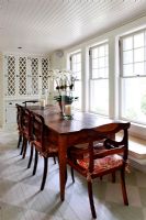 Vintage wooden dining table in country kitchen
