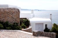Exterior of Greek villa with sea view