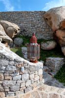 Lantern on stone wall