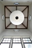 Paper light shade and vaulted ceiling from below
