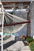 White patio with hammock