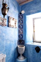 Blue bathroom with marble sink