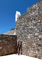 Traditional stone wall of Greek villa