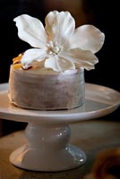 Cake decorated with silk flower