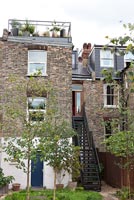 Terraced house with exterior staircase