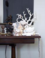 Side table with ornaments