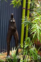 Modern statue and bamboo