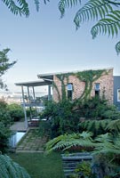 Contemporary house and tropical garden