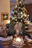 Modern dining table decorated for Christmas meal