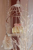 Bird cage with candle