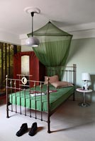 Modern bedroom with vintage furniture