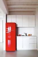 Modern kitchen with retro fridge