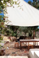 White awning over traditional patio 