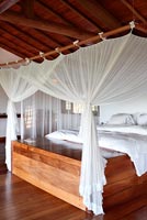 Wooden bed with canopy