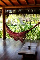 Tropical porch with hammock 
