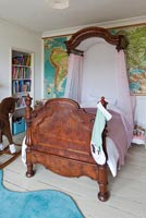 Childs bedroom with vintage bed
