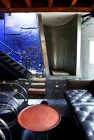 Industrial style living room with water feature