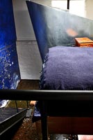 Industrial style blue bedroom
