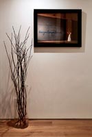 Contemporary painting and arrangement of branches
