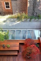 Contemporary decked roof terrace from above
