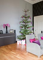 Contemporary living room decorated for Christmas
