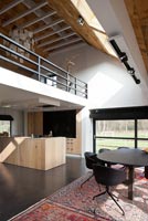 Open plan living space with mezzanine