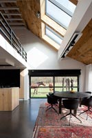 Open plan living space with mezzanine