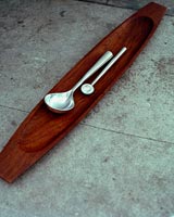 Cutlery on wooden platter