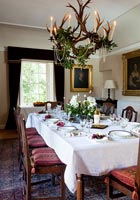 Classic dining room decorated for Christmas meal