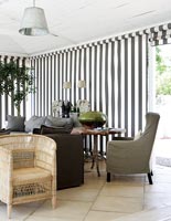 Classic veranda with striped awning