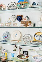 Ceramics display on glass shelves