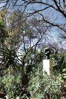 Modern sculpture in tropical garden