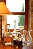 Crystal and glass decanters and bottles 
