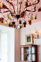 Crystal chandelier with colourful fruit ornaments 