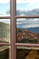 Scenic view reflected in windows, Greece