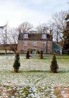 Classic house and garden in winter