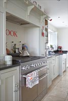 Modern range cooker in country style kitchen