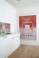 Contemporary kitchen with large poster