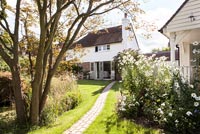 Cottage garden and clapboard house