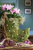 Arrangement of Lilies and Astilbe in moss 'boots'