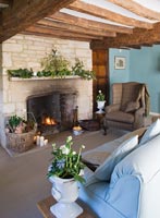 Country living room with cotswold stone fireplace
