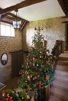 Galleried hall decorated for Christmas